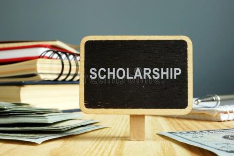 scholarship-concept-notebooks-money-education-149496706