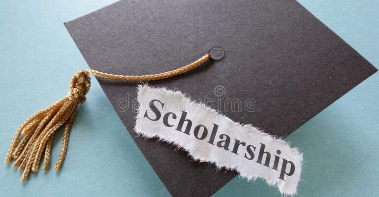 scholarship-paper-note-graduation-cap-